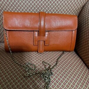 Chic Orange Leather Clutch with Chain Strap